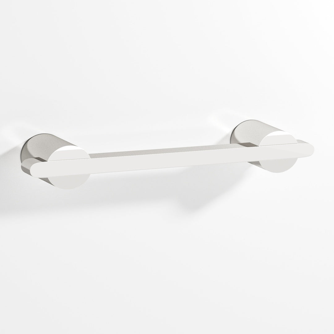 Colonial Bronze 1334 Rectangular Cabinet Pull partially encapsulated by round posts in Polished Nickel