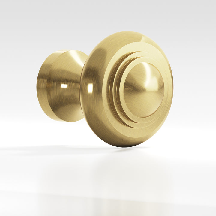 Colonial Bronze 675 Round stepped Cabinet Knob in Antique Brass