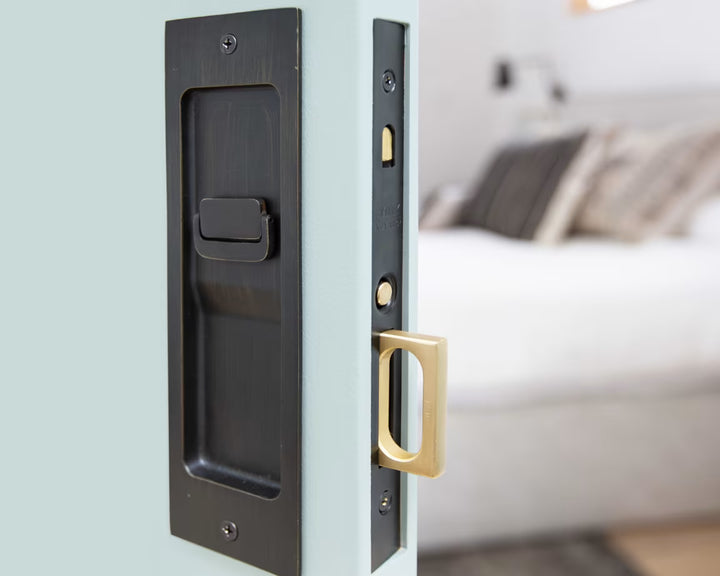 EMTEK - Sandcast Bronze Rustic Modern Rectangular Pocket Door Lock