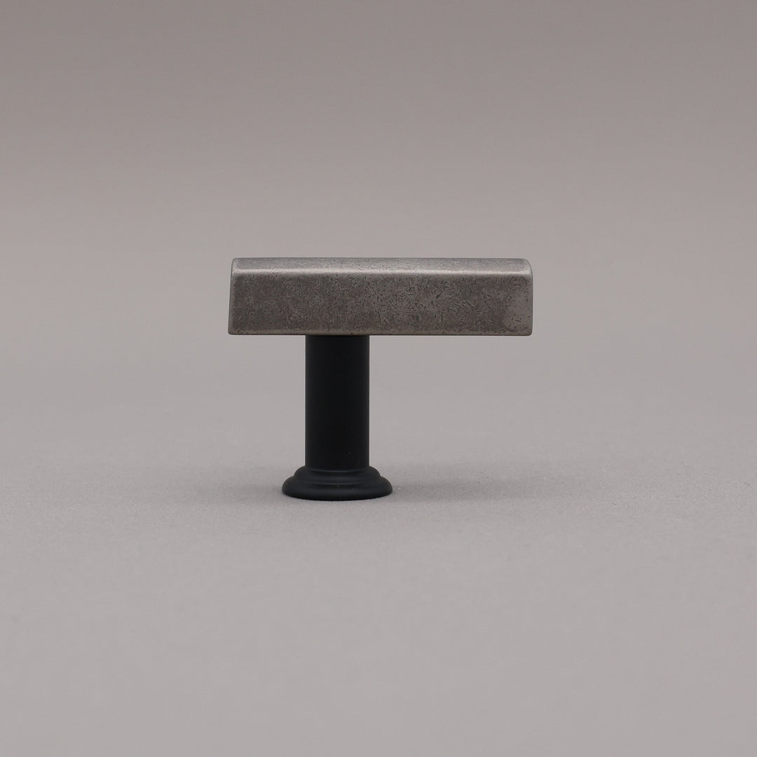 Matte black and weathered nickel t-knob in the mod solid brass collection.