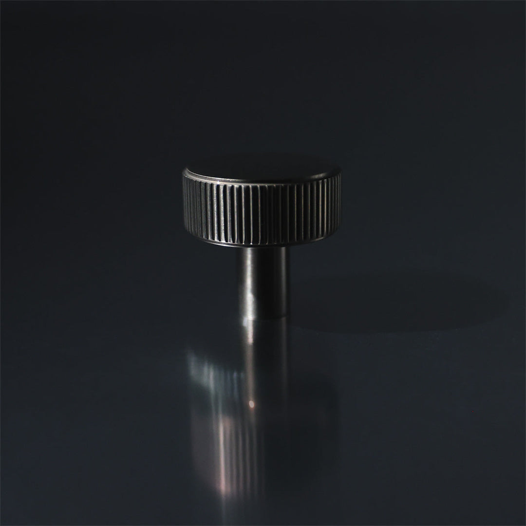 Ribbed Knob on Mirrored Surface.