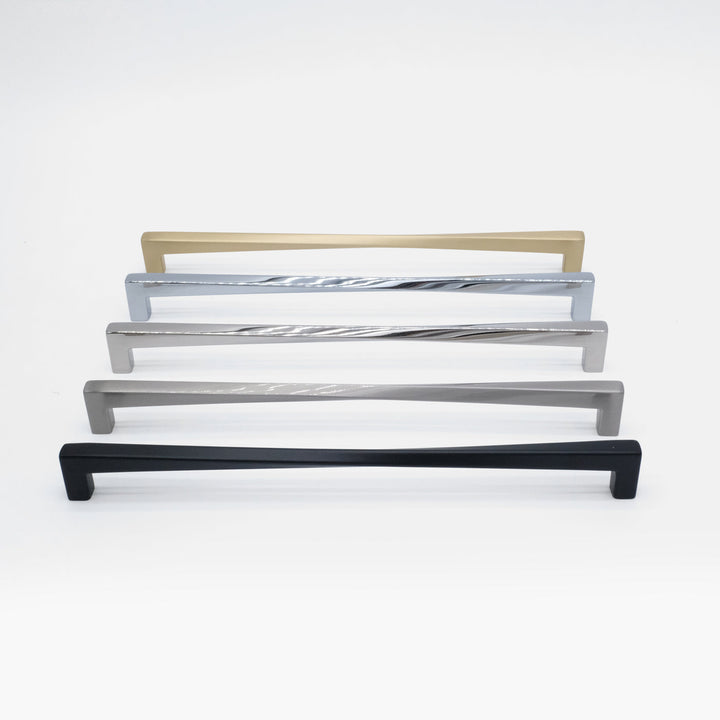 Five twisted appliance pulls arranged in a line, one in each offered finish